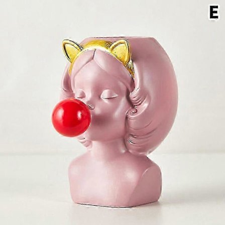 Kukkakoristeellinen maljakko, jossa on suloinen hartsi-tyttöpurukumihahmo