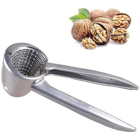 Nötknäppare och champagnetång för valnötter och champagneflaska