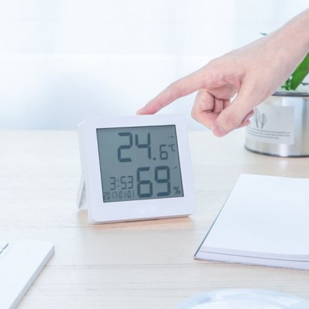 Inomhustermometer med klocka