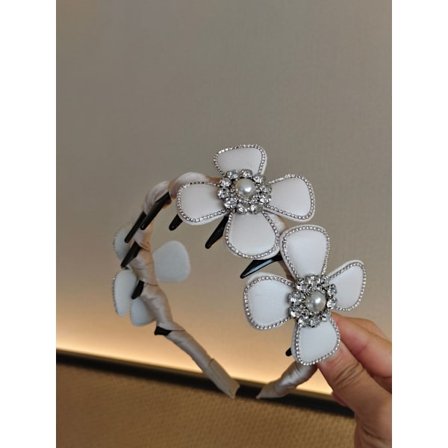 Princess of Paris hårbøjle, let luksus og high-end stil, snoet, med takker, blomsterbesat og diamantbesat hårnål