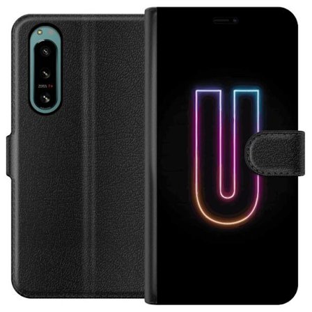 Yhteensopiva Lompakkokotelo Sony Sony Xperia 5 IV Minimaalinen neonkirjain U kirkkaalla valaistustehosteella mustaa taustaa vasten