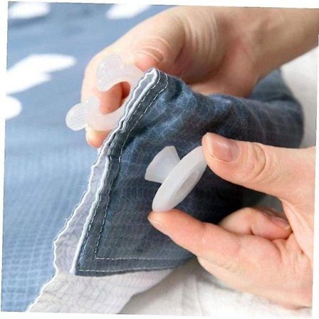 Kotisängyn pussilakanan pidikkeet muoviset cover Kiinnikkeet Makuuhuoneen vuodevaatteet peitot Kiinnityspidike Gripper läpikuultava 4kpl