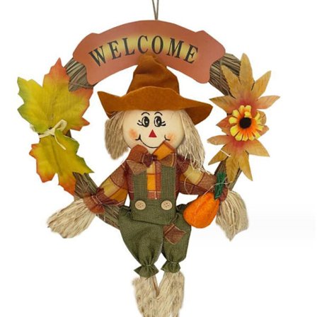 Halloween-krans med skrämmafigur att hänga på väggen