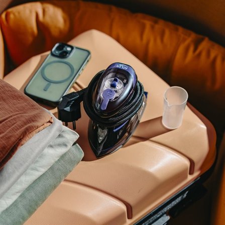 Dampstrygejern til rejsen med keramisk strygesål og to spændingsindstillinger