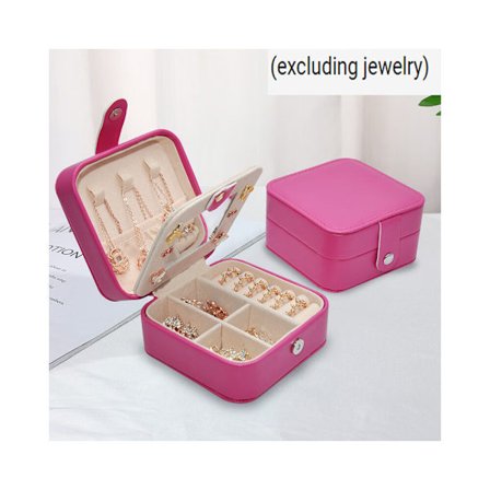 Ett smyckeskrin i ett stycke (rosröd) med spegel för ringar