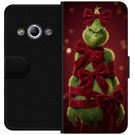 Kompatibel Tegnebogsetui til Samsung Galaxy Xcover 3 Grinch-figuren dekoreret med røde velourbånd i en festlig studieindstilling med legende og humo