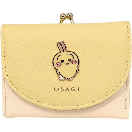 En söt liten gul plånbok, en liten present till flickor