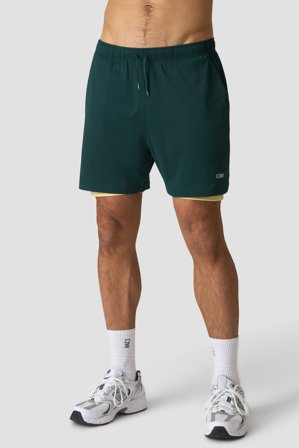 ICANIWILL - Stride 2-in-1 Shorts Green/Yellow - Kortbyxor - Herr - Träningskläder från ICIW