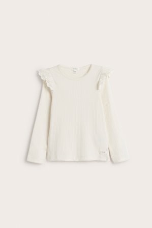Newbie | Ribbad topp med volanger | Offwhite