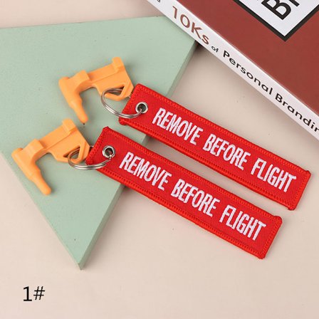 Taktisen kammion turvalippu sisältää sisäänrakennetun Flathead Tool Hu:n