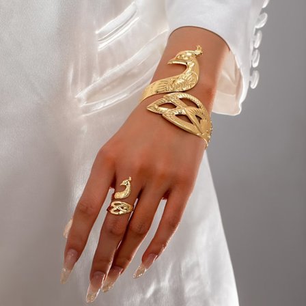 Stilig og unikt todelt sett med en elegant og søt Phoenix åpen armring og ringkombinasjon.