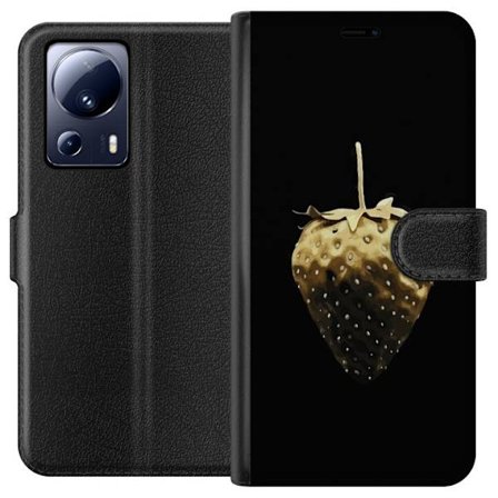 Yhteensopiva Lompakkokotelo Xiaomi 13 Lite Kultainen mansikka mustaa taustaa vasten