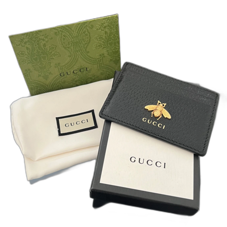 Svart korthållare från Gucci med guldbi