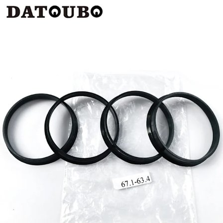 4 stk. svarte plastbilhjul 67,1 mm-54,1 mm; 67,1-60,1 mm; 67,1-59,1 mm; 67,1-56,1; 67,1-63,1, 67,1 til 57,1 sentriske ringer