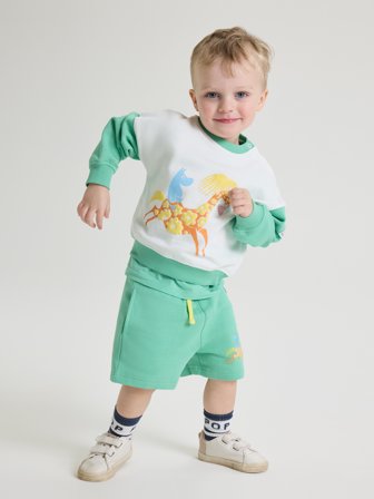 Polarn O. Pyret - Moomin sweatshorts - 122 - Childrenswear - green