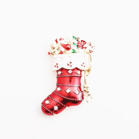 Julebrosje med emalje i form av fugler