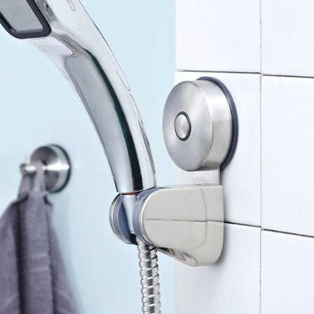 Hållare för duschmunstycke i rostfritt stål utan stansning