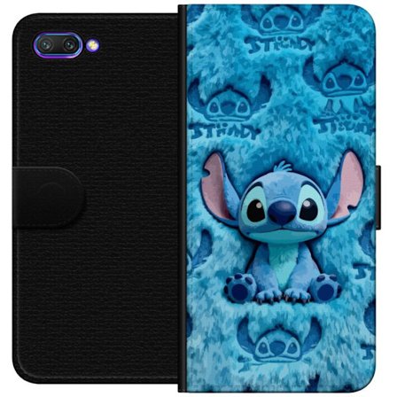 Honor 10 Plånboksfodral Stitch sitter på fluffigt blått mönster med sitt ansikte och öron upprepade som textur, vilket skapar ett sött och gosig