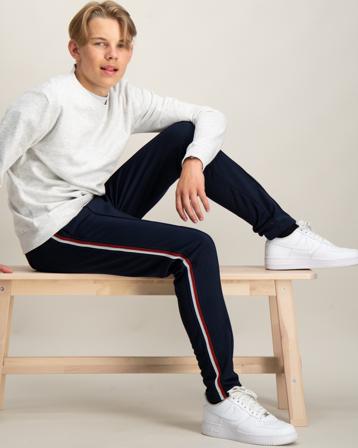 Tommy Hilfiger GLOBAL STRIPE REG TRACK PANTS Blauw Broeken Jongens - Kids Brand Store