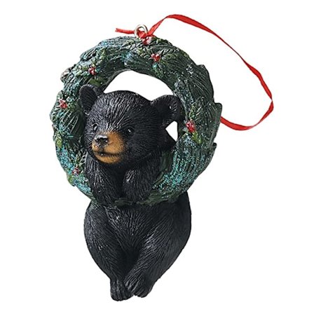 Små dekorativa juldjur som hänger till julgran