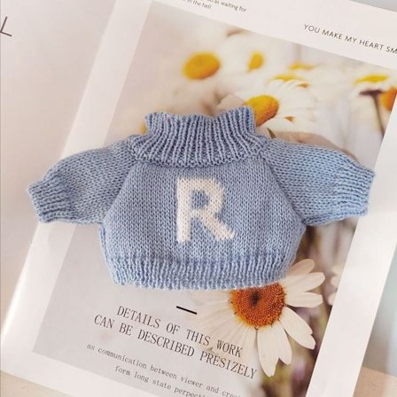 Dukkegensere strikket kåpe 1 1