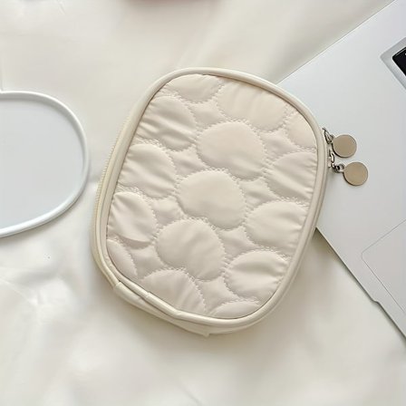 En kompakt og elegant makeup-taske til touch-ups, perfekt til rejser og let at bære.