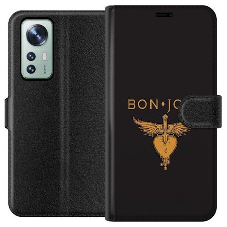 Kompatibelt Plånboksfodral till Xiaomi 12 Ikonisk musikillustration med bevingat hjärta och dolk i guldtoner på mörk bakgrund, kraftfull och symbo