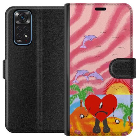 Kompatibel Tegnebogsetui til Xiaomi Redmi Note 11 Bad Bunny i en farverig quiltet jakke med hjertemønster og solbriller i moderne gade stil