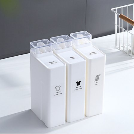 Hvit vaskemiddelbeholder for vaskemiddel