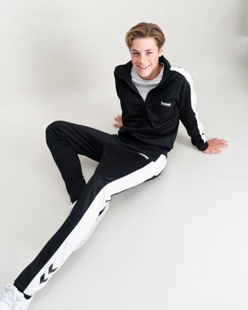 Hummel hmlJR COLORBLOCK TRACKSUIT Zwart Trainingspakken/Tracksuits Jongens - Kids Brand Store