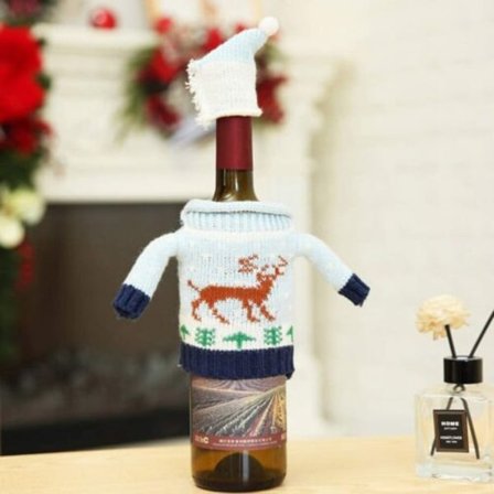 Fyra stycken julvinflaskkorkar fula tröja flaska väska