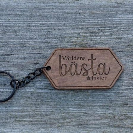 Nyckelring "Världens bästa faster" i trä.