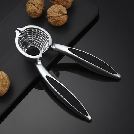 Valnötsklämma i zinklegering, fjäderbelastad, för att knäcka valnötter