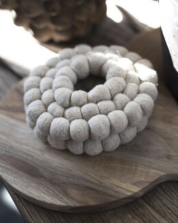 Gryteunderlag Rulle Lin