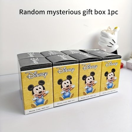 En tilfældig mystisk gaveæske med figurer som Mickey Mouse og Anders And, sammen med en sjov figur. Perfekt til at dekorere dit skrivebord eller