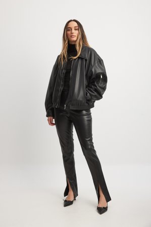NA-KD Trend PU-Hose mit Schlitz vorne - Skinny Hosen - Schwarz - EU 38