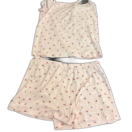 Ljusrosa linnetopp med körsbär shorts