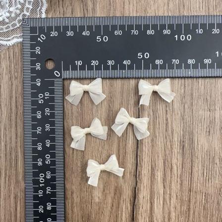 10stk perleskimrende garn Sløyfe Nail Art Dekorasjon BEIGE beige