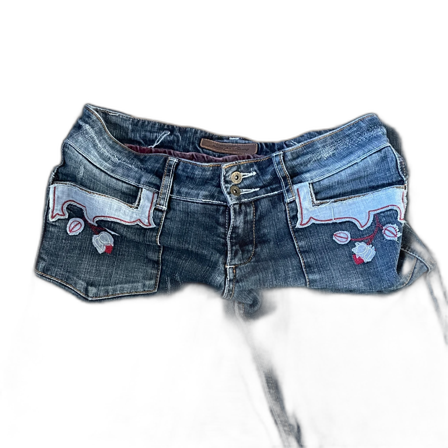 Blå lågmidjade jeans med broderade detaljer