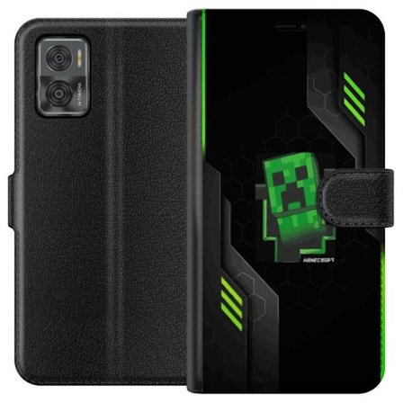 Kompatibelt Plånboksfodral till Motorola Moto E22i Minimalistisk grön Creeper-figur i pixeldesign med futuristisk techbakgrund och geometriska forme