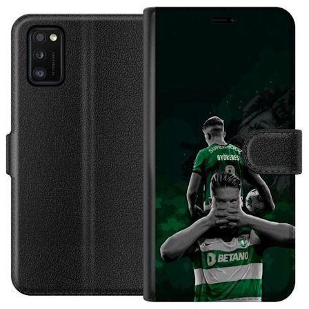 Yhteensopiva Lompakkokotelo Samsung Galaxy A41 Neonmotiivi, jossa teksti "Gaming is in my DNA" sinisenä ja punaisena tiiliseinällä, jossa loistava DNA