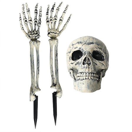 Gräsmattestaket i form av ett realistiskt skelett - idealisk trädgårdsdekoration