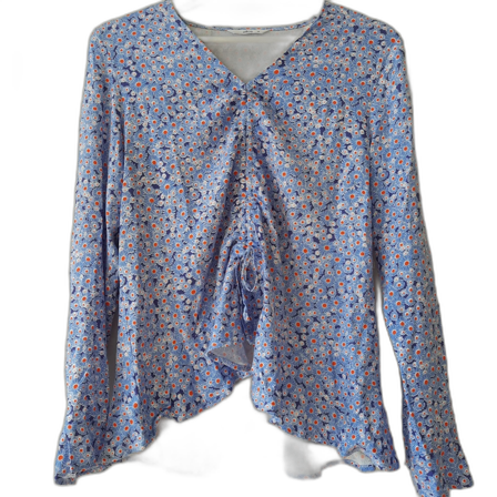 Blommig blus med volanger