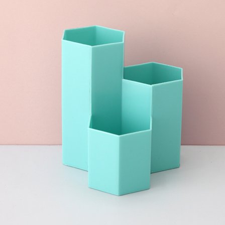 Sininen monitoiminen kuusikulmainen luova purkki meikkisiveltimien säilytykseen