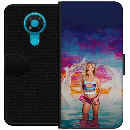 Kompatibelt Lommeboketui til Nokia 3.4 Blond kvinne i fargerik strandantrekk som leker i havet ved solnedgang