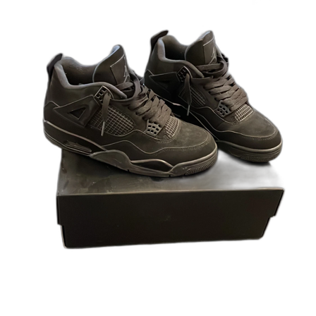Black cat Jordan 4 Retro sneakers