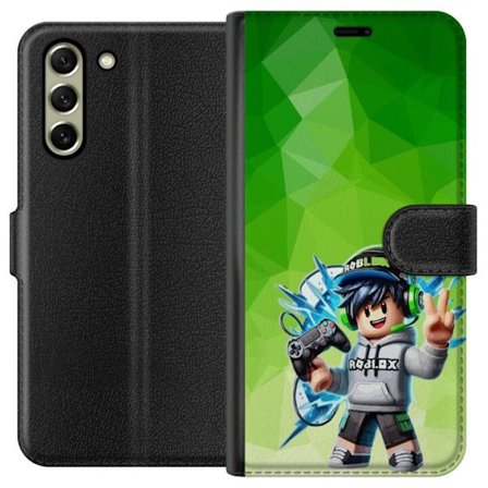 Kompatibelt Lommeboketui til Samsung Galaxy S21 FE 5G Roblox-inspirert gamerfigur med headset, håndkontroll og energiske effekter mot grønn bakgrunn