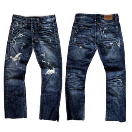 Jeans med wash och slitningar