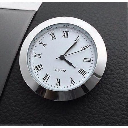 Rundt urværk erstatter miniur med romertal (FMY)