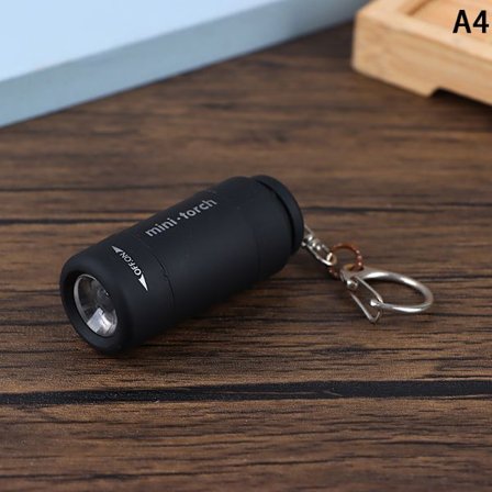 Udendørs bærbar lommelygte lille nøglering lys USB-opladning f